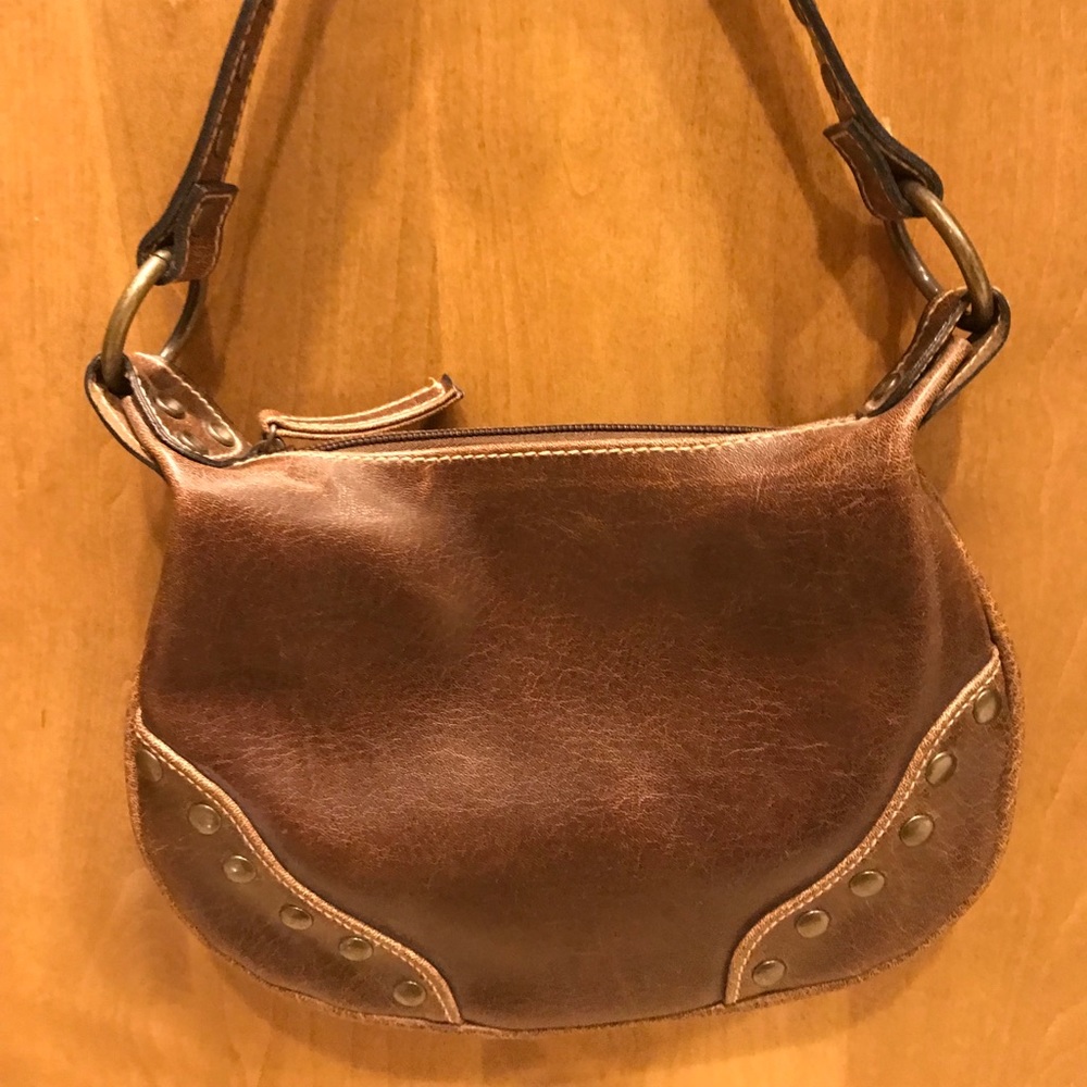 Brown purse with studs and studded strap
